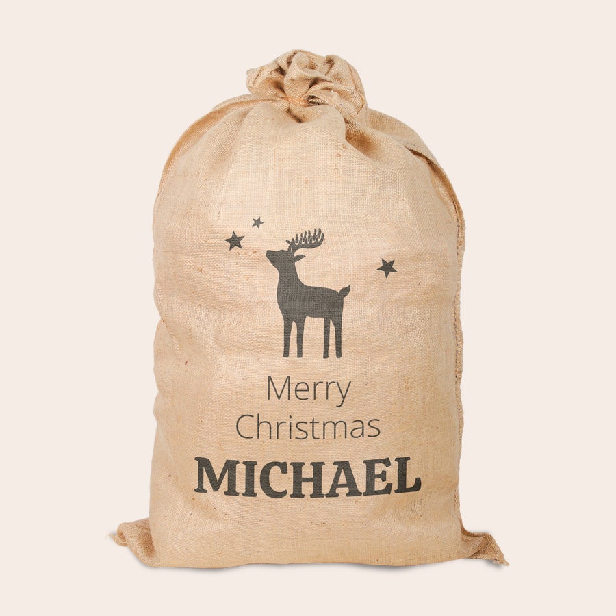 Saco de Navidad con nombre Saco de Navidad de yute personalizado, impreso con un reno, estrellas, el texto "Merry Christmas" y el nombre "MICHAEL"