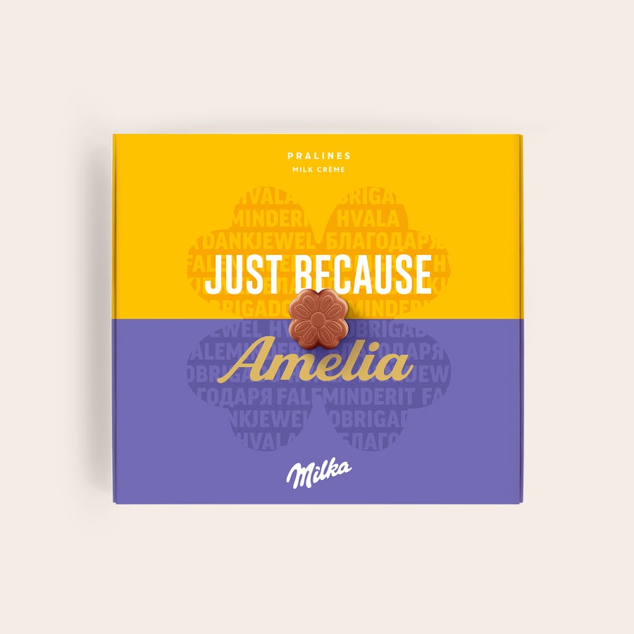 Milka Praliinit Kiitos Yksilöllinen Milkan suklaarasia, jossa on painettu teksti "Just Because" ja nimi "Amelia"