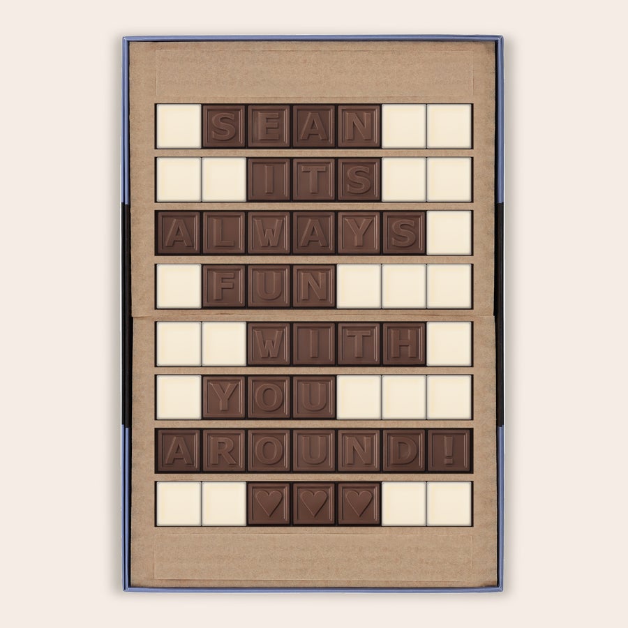 Chocotelegram® Czekoladowa wiadomość z napisem SEAN ITS ALWAYS FUN WITH YOU AROUND ułożona z liter i serc