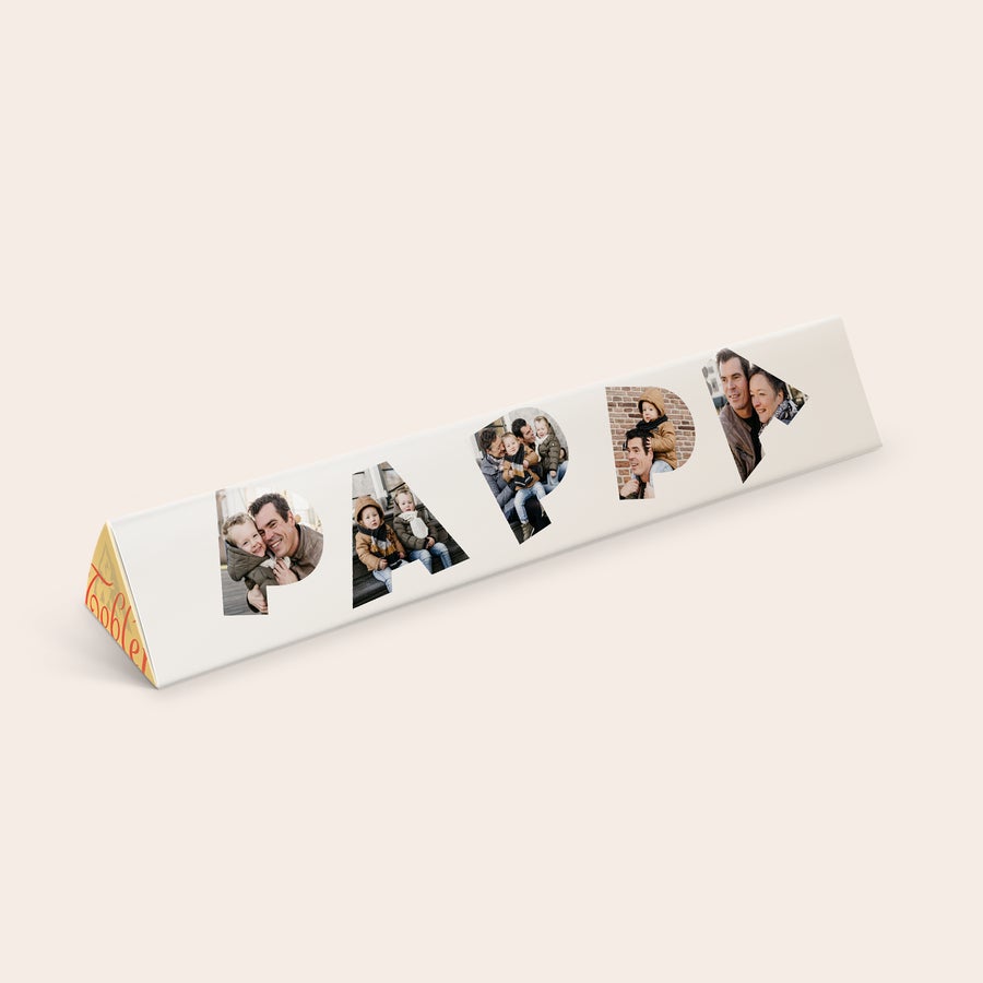 Toblerone med namn Personaliserad Toblerone med tryckt omslag format som PAPPAD med familjefoton. En personaliserad Toblerone är betydligt godare.