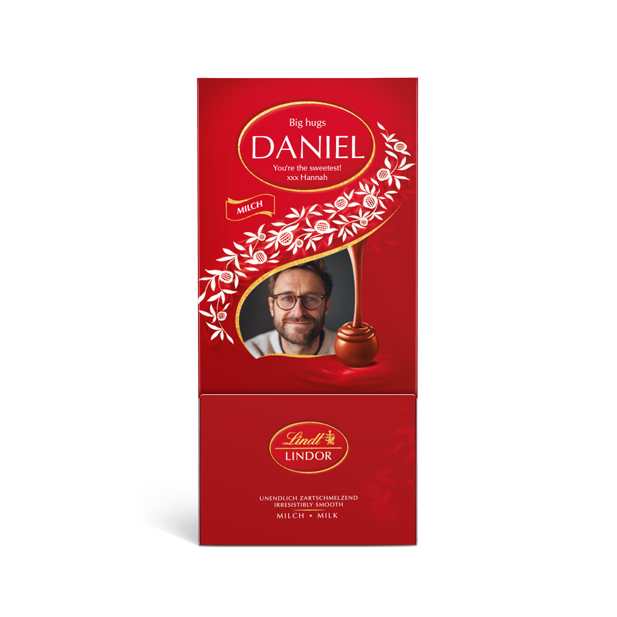 Červená dárková krabička na čokoládu Lindt s personalizovaným potiskem, jménem Daniel a fotkou.