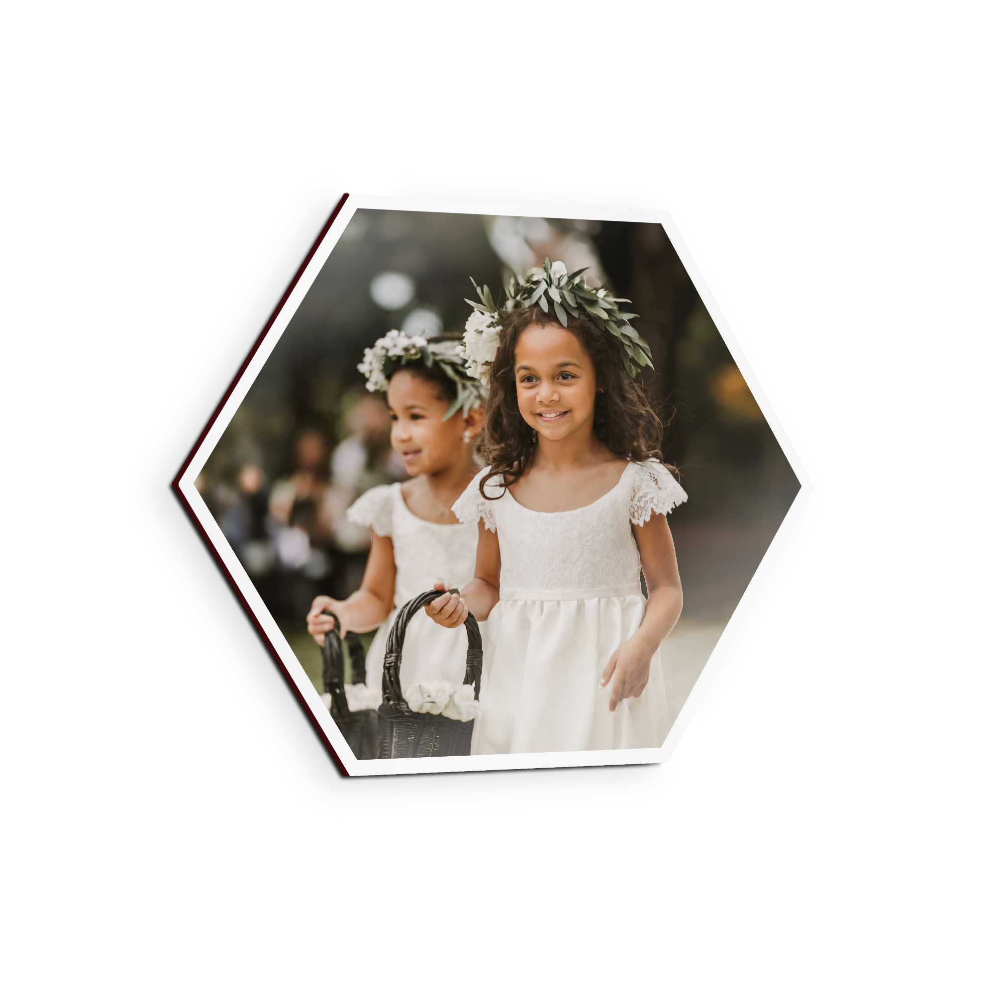Hexagonal wooden wall art panel printed with a custom photo of two flower girls in white dresses holding baskets