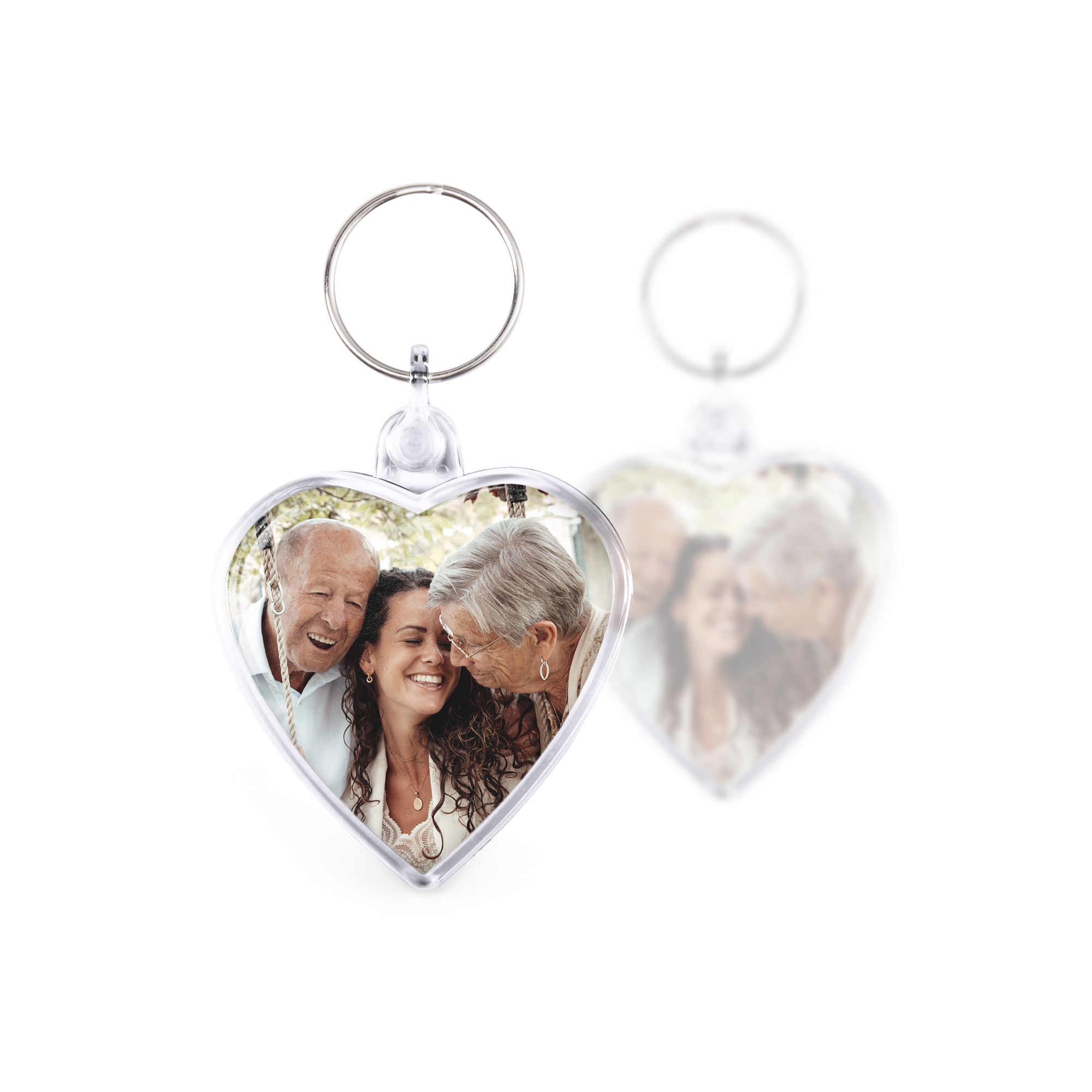 Llavero personalizado con forma de corazón impreso con foto de familia en ambas caras.