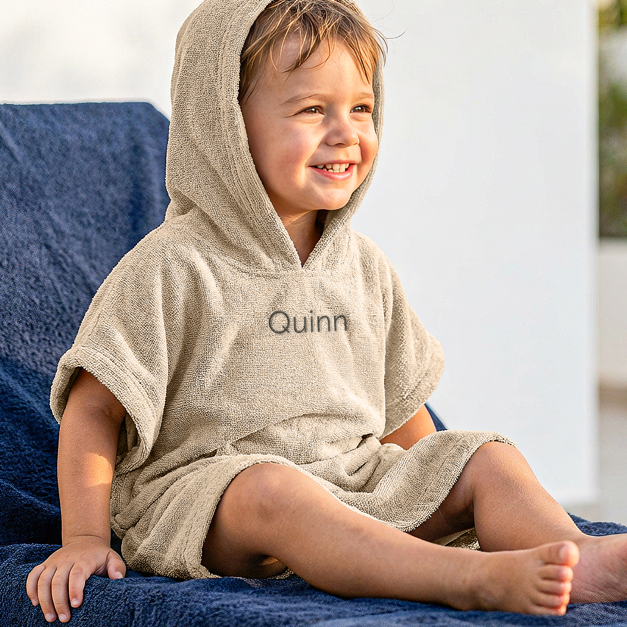 Kinderponcho met naam geborduurd