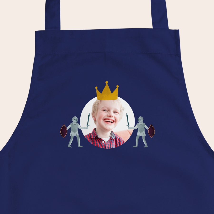 Children's Apron Dark blue children's apron printed with a photo of a smiling boy in a king's crown and two knights, a personalized children's apron.