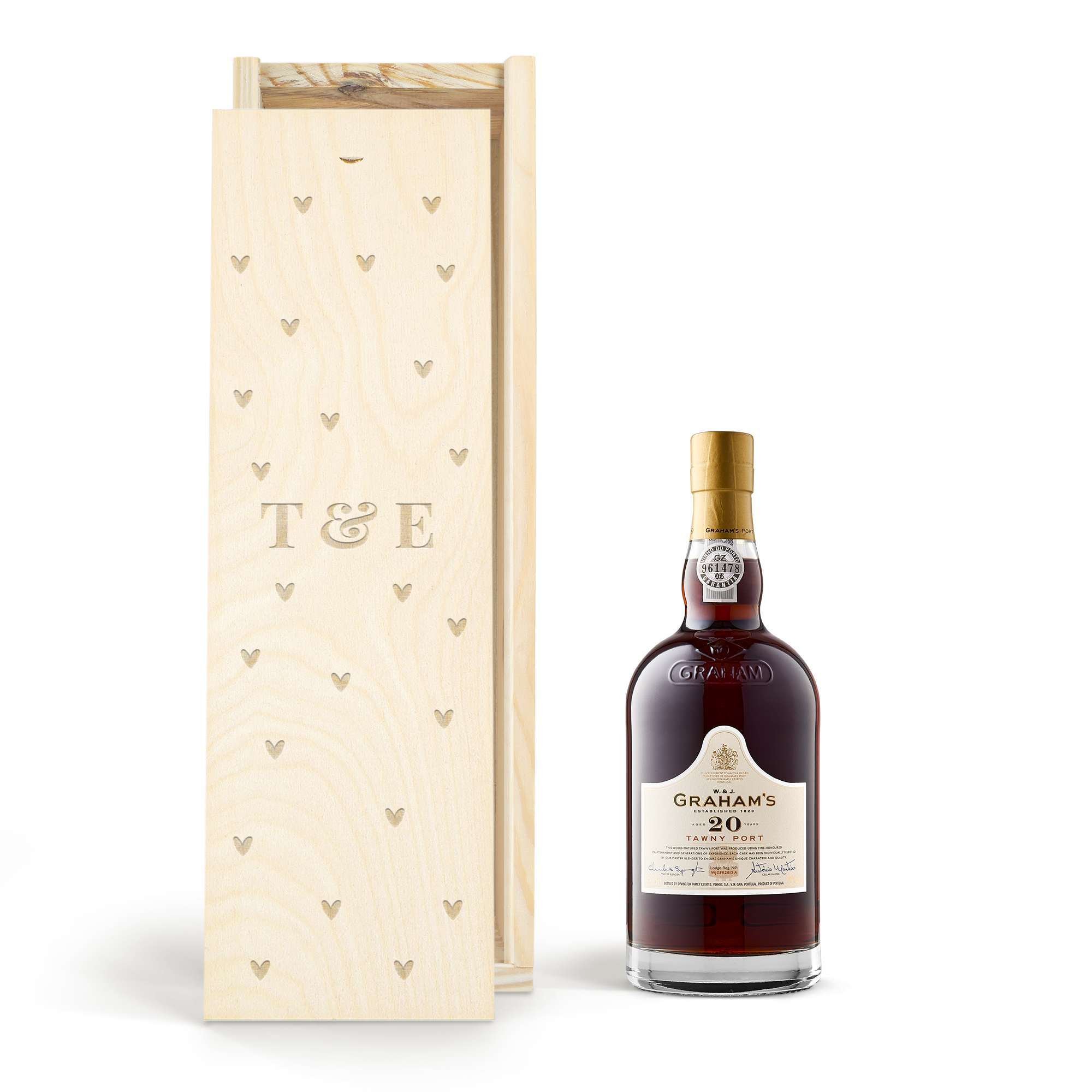 En flaska Graham's Tawny 20 Years port i ett graverat träfodral med texten T&E och hjärtan, perfekt för att överraska dina nära och kära.