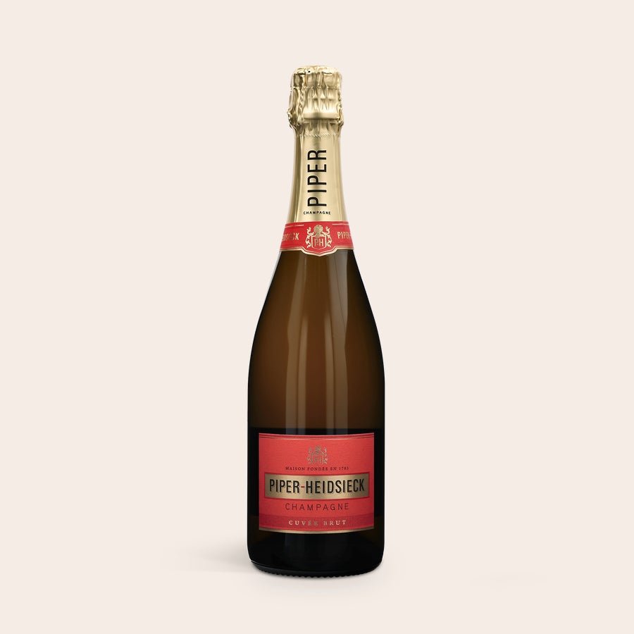 Piper Heidsieck Brut - Champagner mit Gläsern Piper Heidsieck Brut - Champagner mit Gläsern
