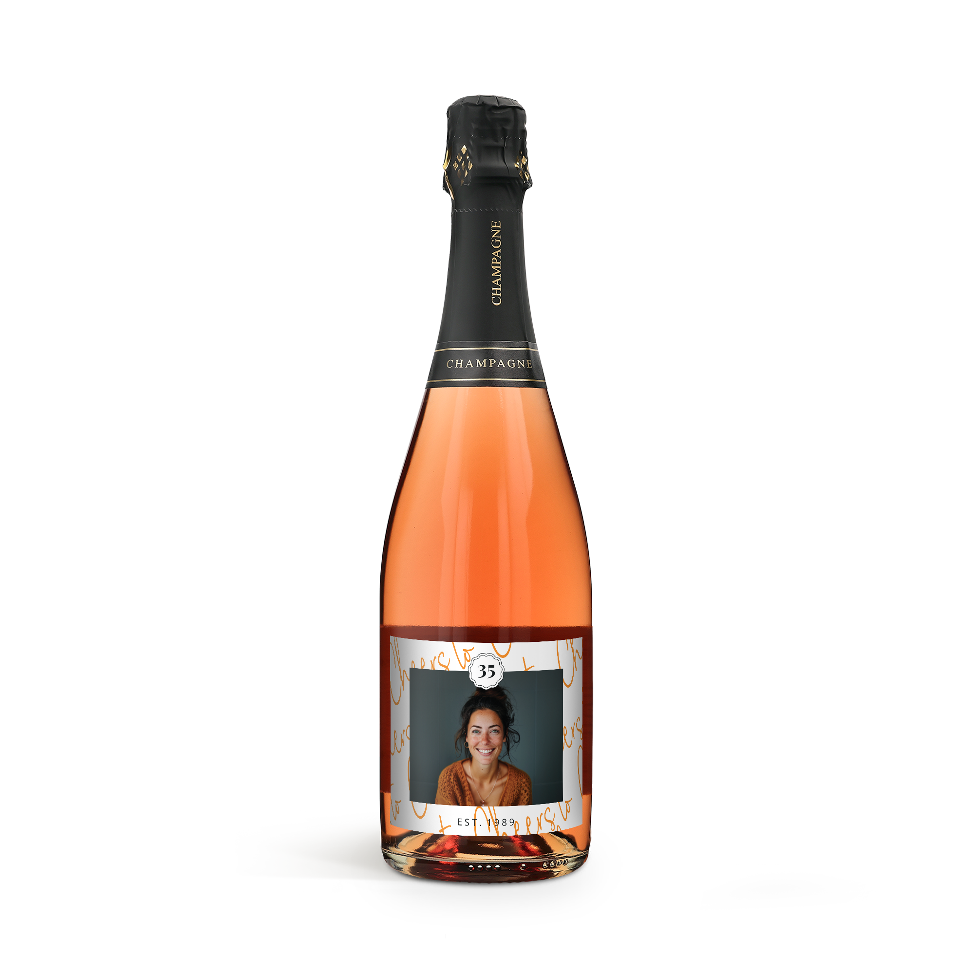 Bouteille de champagne rosé personnalisé avec étiquette imprimée d'une photo et texte 35 et Est 1989. Célébrez chaque occasion avec une délicieuse bouteille de champagne rosé personnalisé