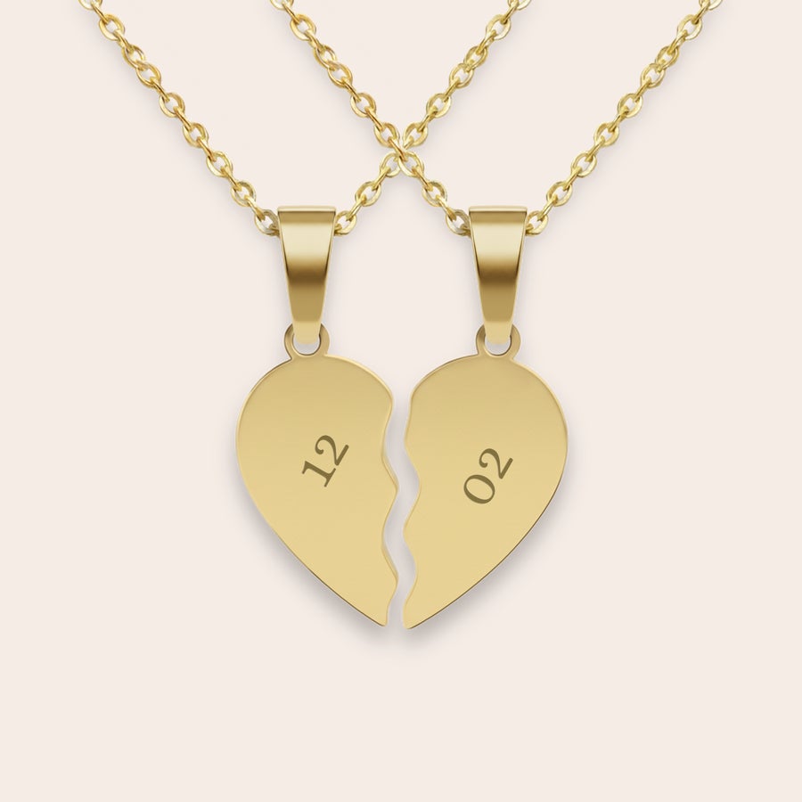 Collana con cuore spezzato inciso Collana con cuore spezzato inciso