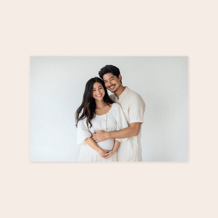 Photo on forex Custom photo on forex featuring a smiling couple. He stands behind her with his hand on her baby bump.