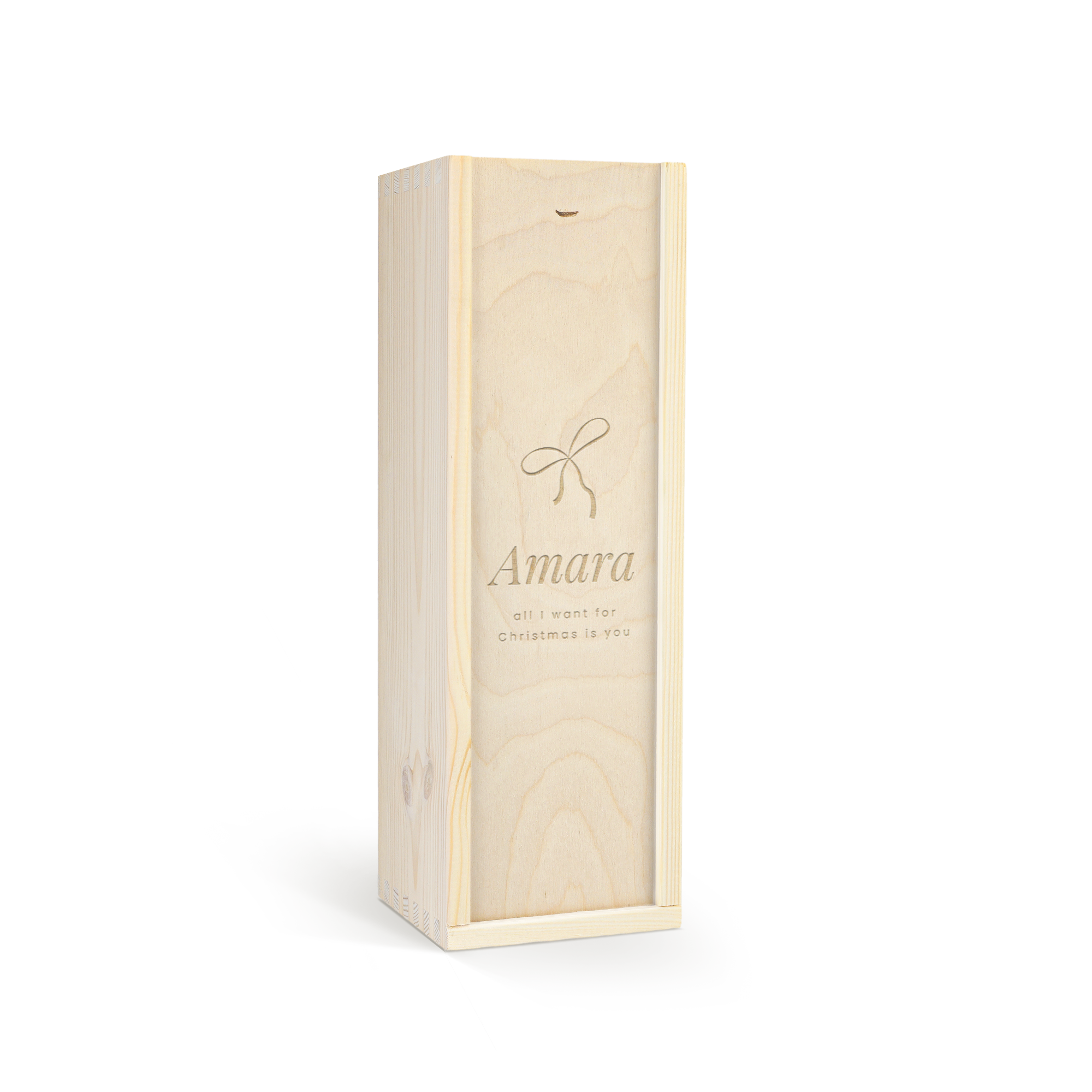 Cassetta in legno chiara personalizzata con nome Amara e dedica incisa "all I want for Christmas is you" con un fiocco