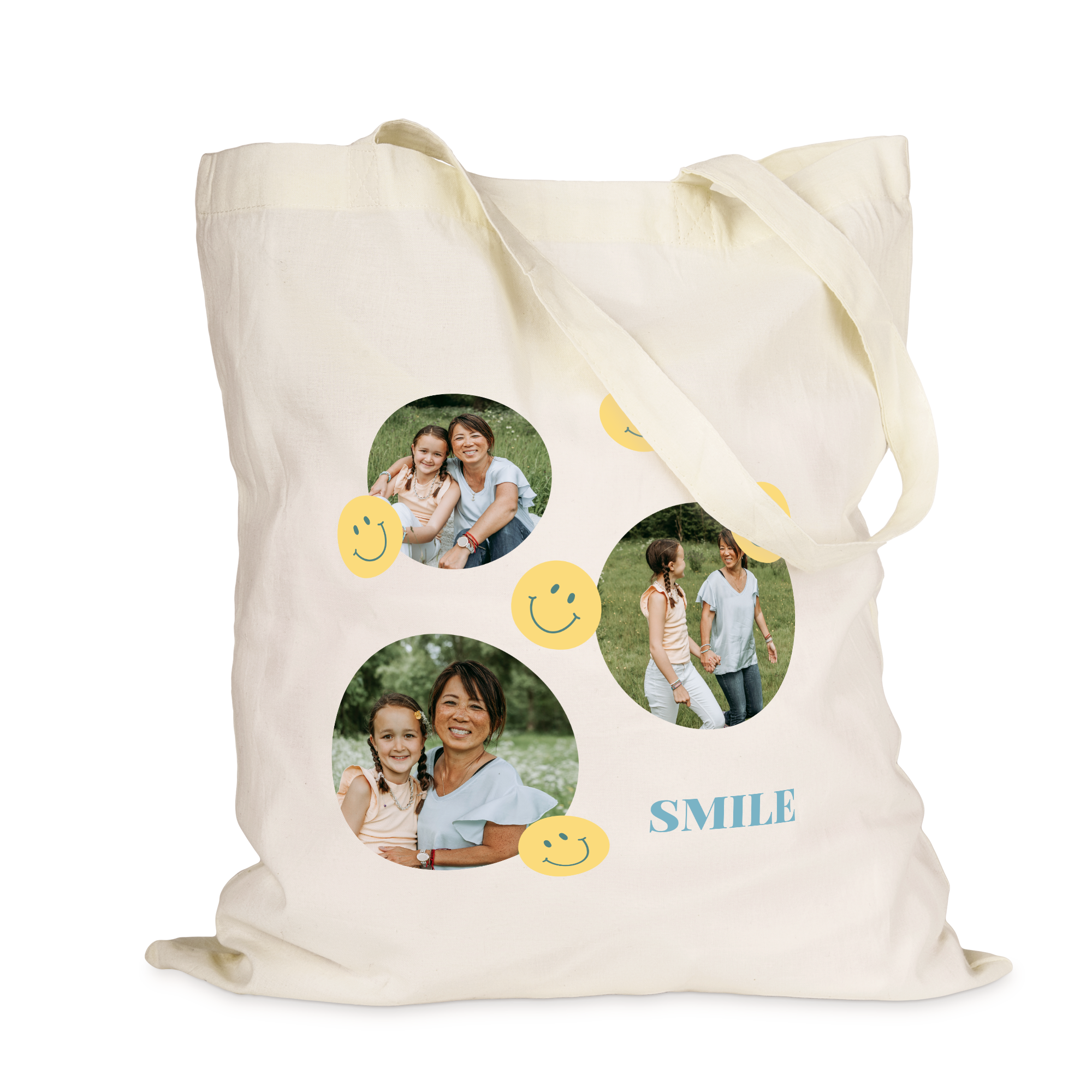 Cream personalized tote bag printed with three round photos and yellow smiley faces, featuring the word SMILE.
