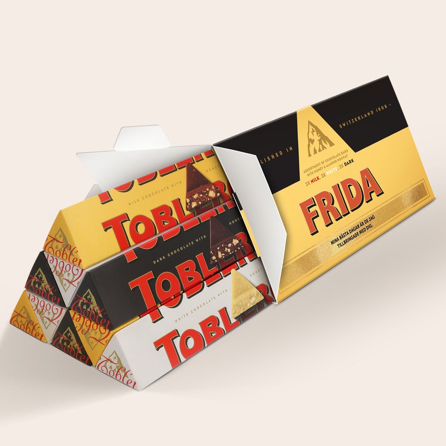 Toblerone med namn Personlig XL Toblerone Selection chokladkaka med namnet Frida och texten Mina bästa dagar är de jag tillbringade med dig tryckt på förpackningen.