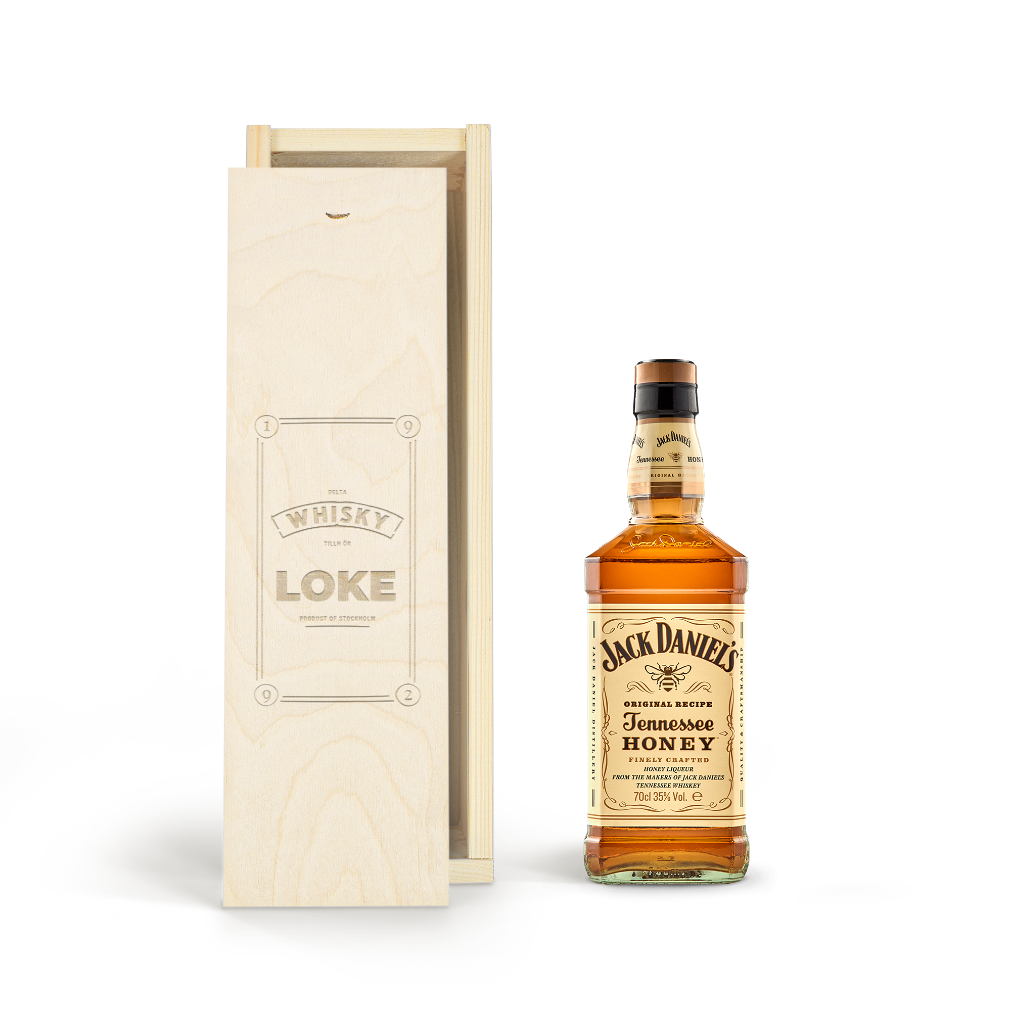 Överraska med en flaska Jack Daniels Honey whisky i en graverad träask med namnet LOKE